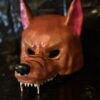 3D printed feral wolf mask with sharp fangs and brown hand-painted finish.